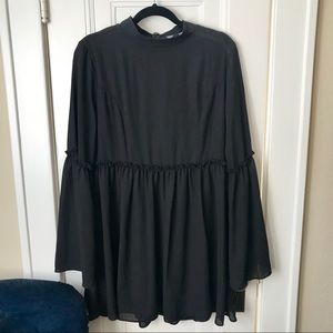 Lulu’s Long sleeve/High neck w/ flowy sleeves